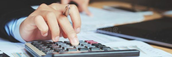 close-up-hand-accountant-using-calculator-laptop-concept-s-close-up-hand-accountant-using-calculator-laptop-concept-114060184