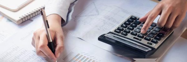 finance-accounting-concept-business-woman-working-desk-using-calculator-to-calculate-office-finance-accounting-141544975